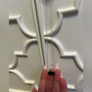 Gold chain black pendant Kendra Scott necklace.